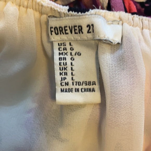 Short floral strapless dress with an open back - Picture 4 of 8